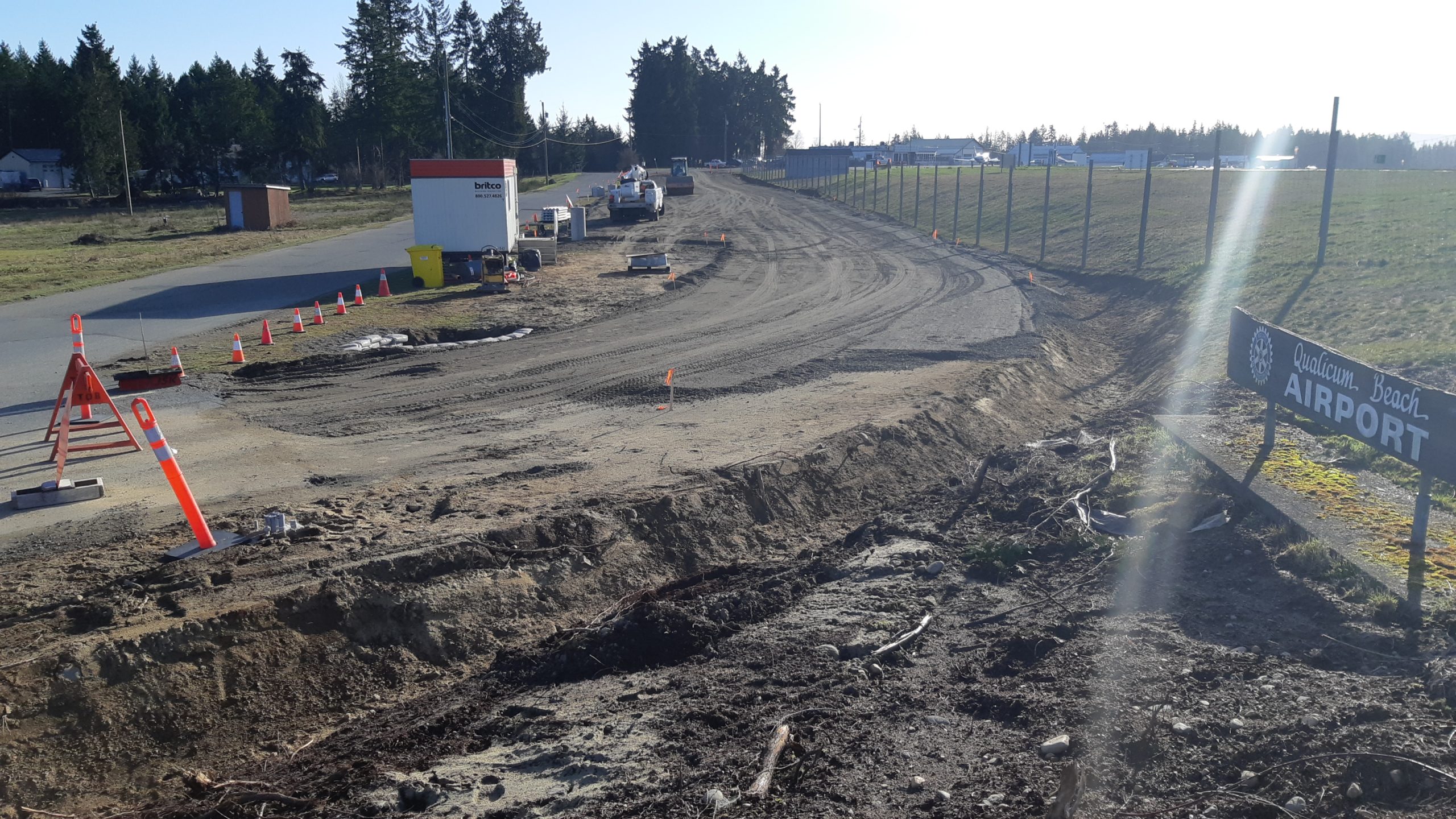 photo of muddy construction site of the airport parking