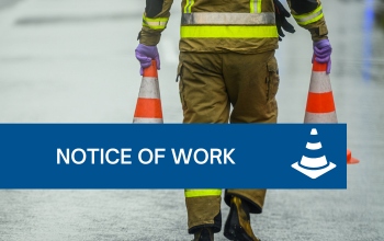 Design for Notice of Work - featuring a workman holding construction cones