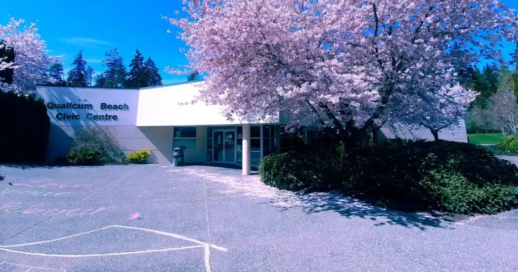 Image of Civic Centre building with trees in bloom in Spring