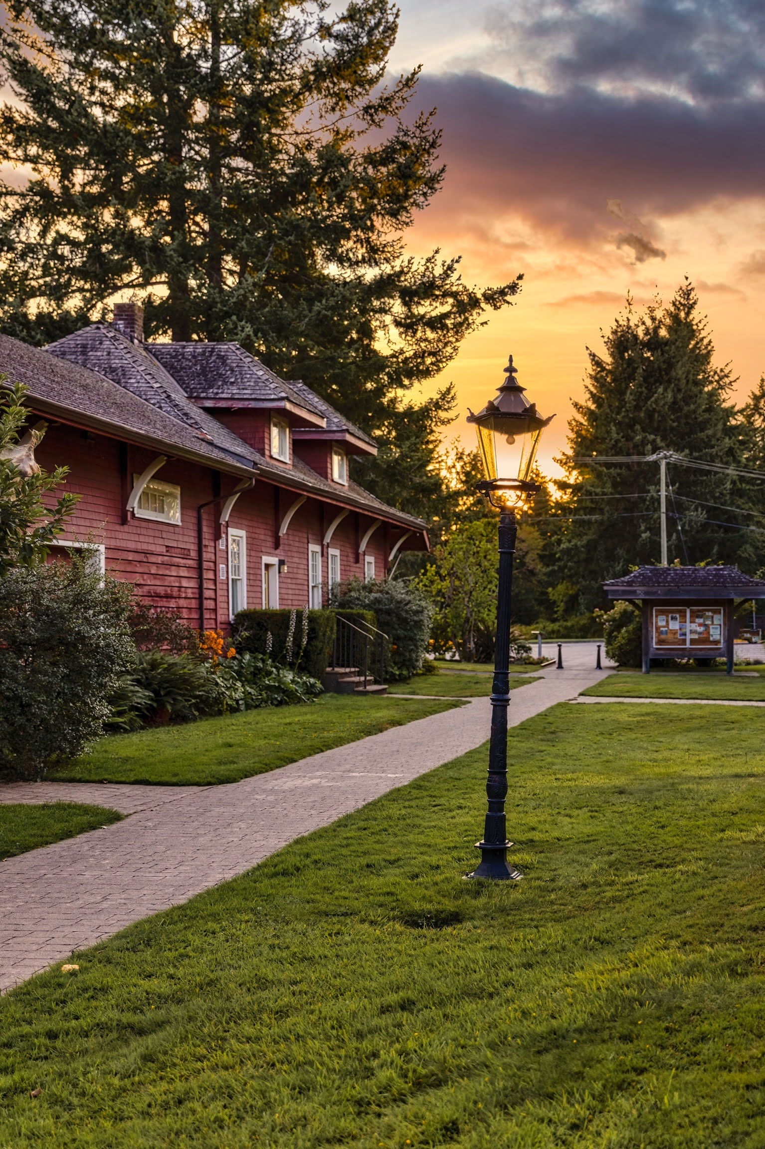 A building with a sunset in the background.