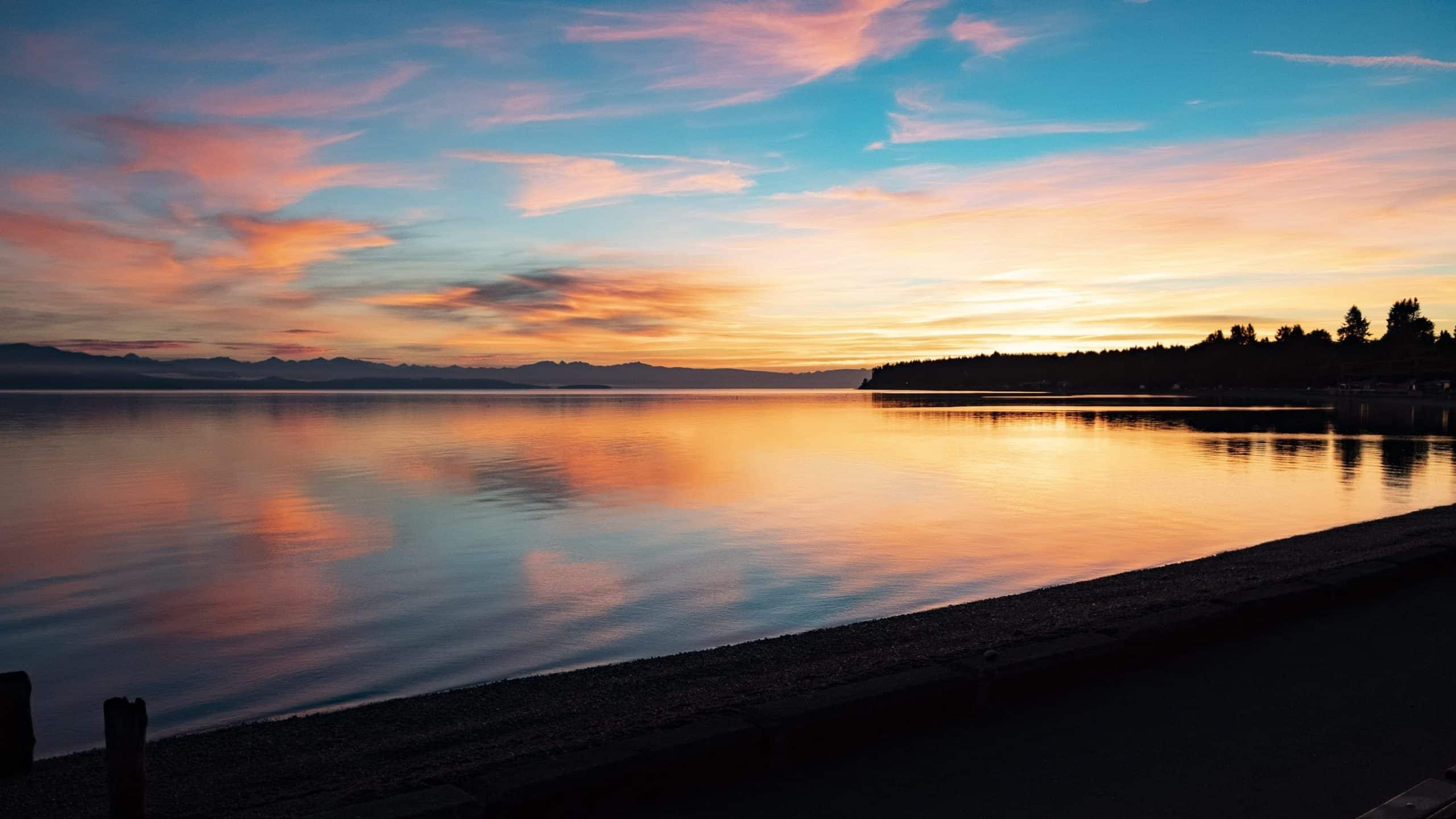 A still ocean at sunset.